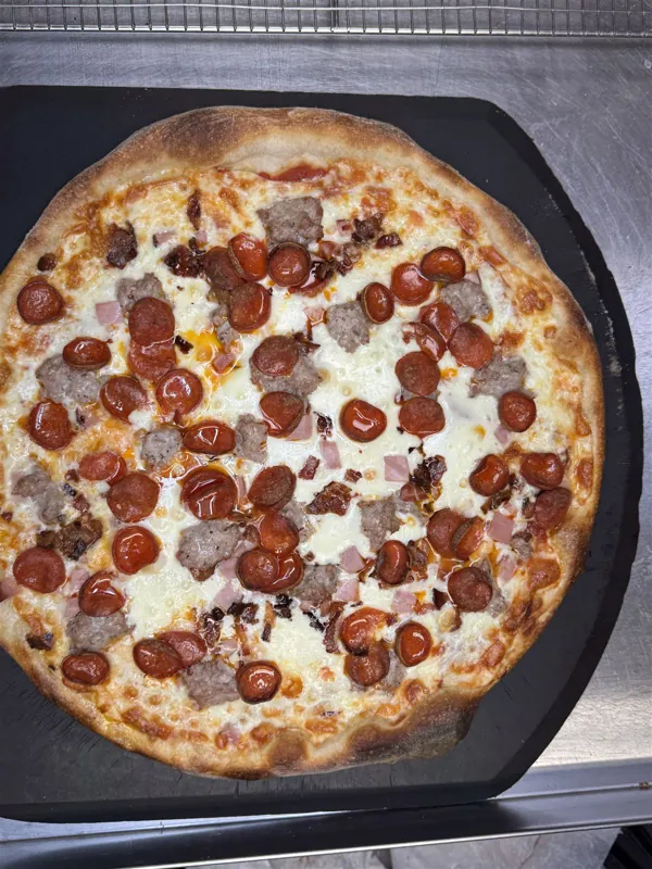 Whole pizza with pepperoni and sausage